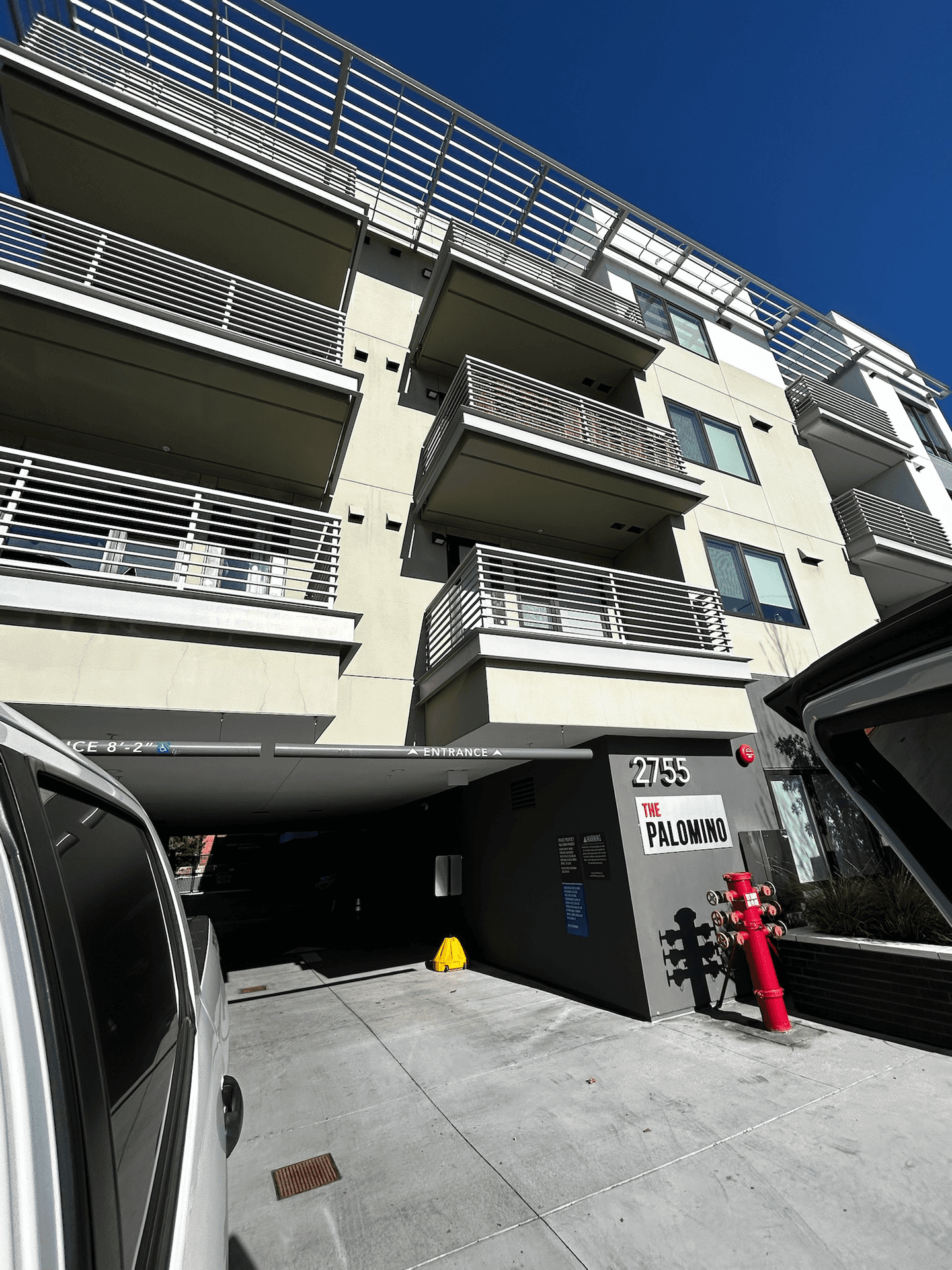 Custom stair railing fabricated and installed for apartment building landing in Northern California