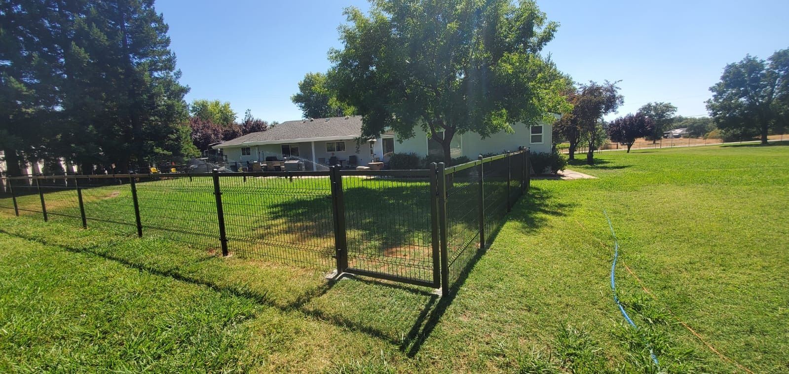 Custom-fabricated steel fence welded and installed for residential property in the Bay Area